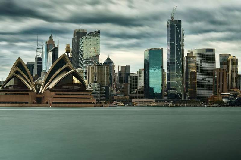 Sydney Harbour's sailing fleet with the Opera House and skyline behind