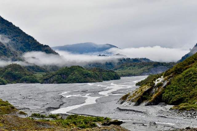 Braided river and rainforest below the Southern Alps near Franz Josef